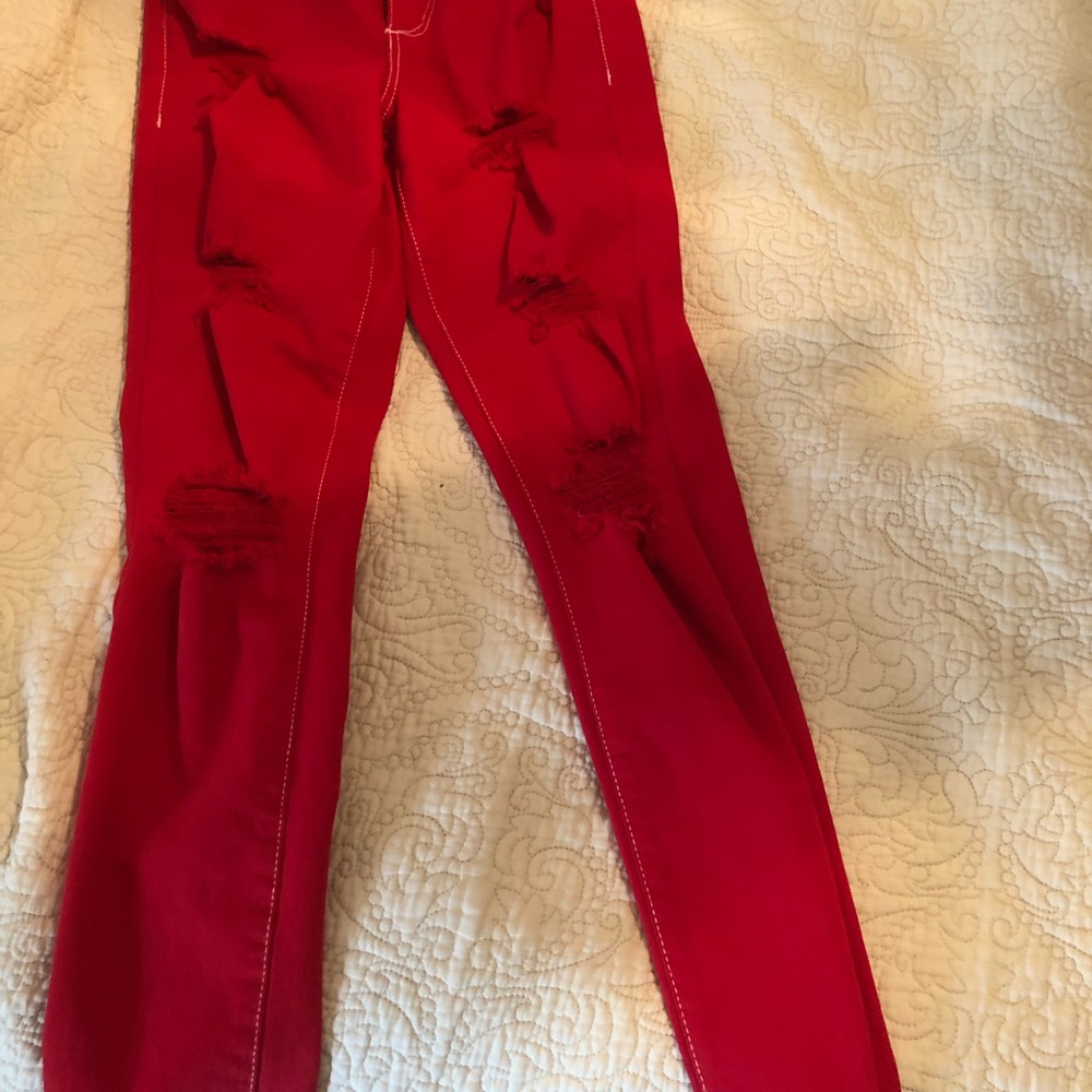 Red jeans for woman WITH TAGS NEVER WORN!!!!